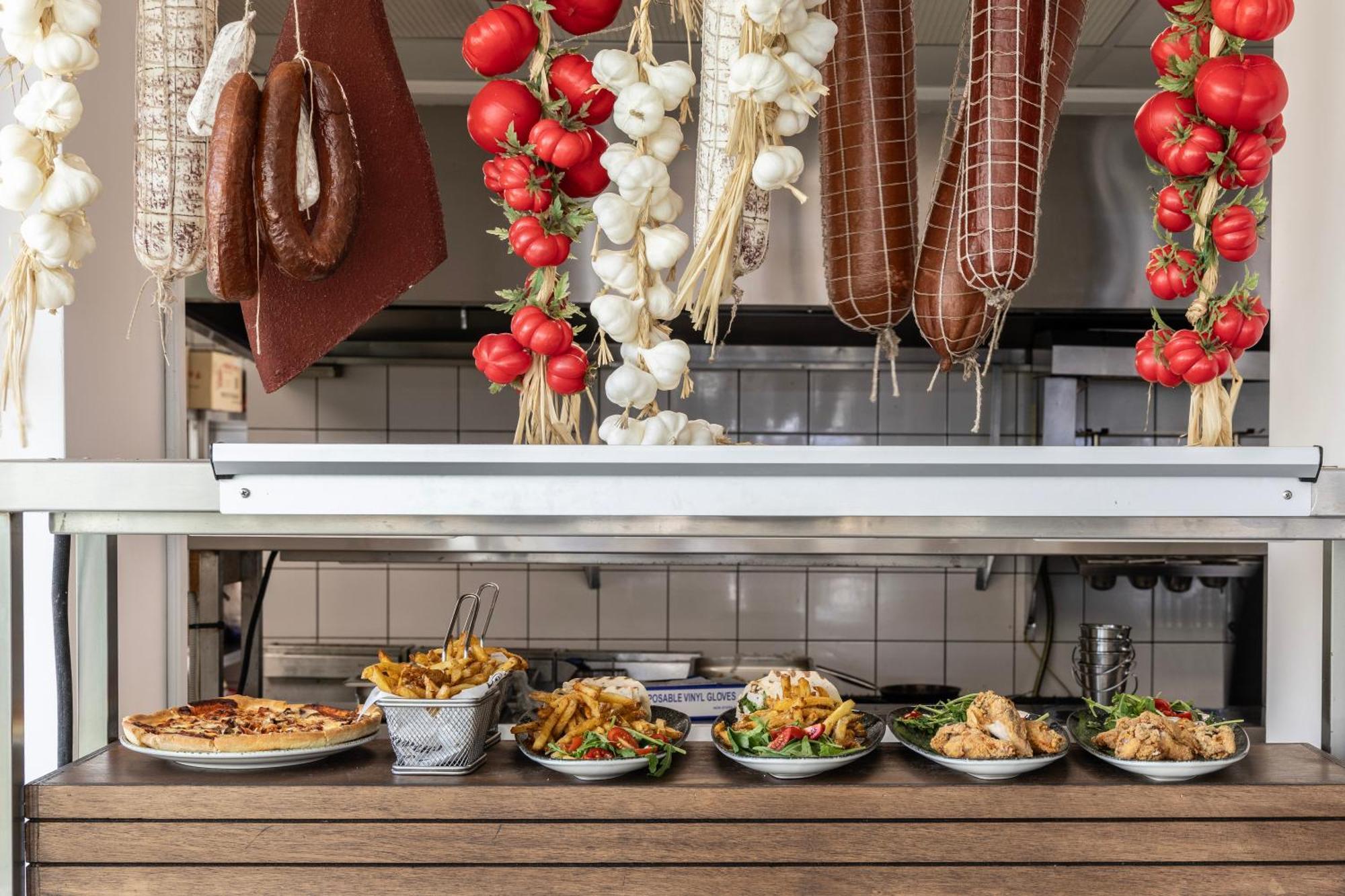 Ivi Mare - Designed For Adults By Louis Hotels Geroskipou Exterior foto A display of prepared tapas at a restaurant in Madrid